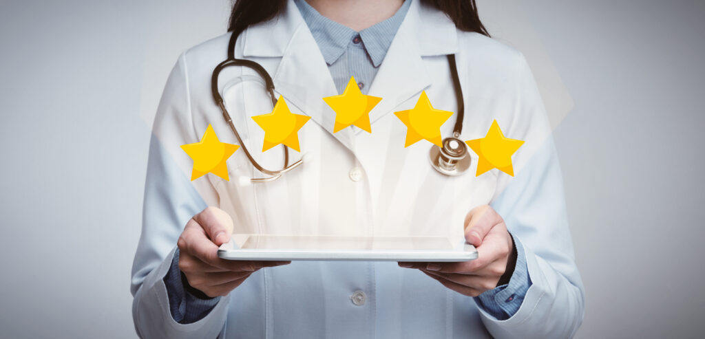 doctor holding five stars