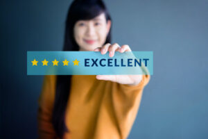 woman holding excellent review